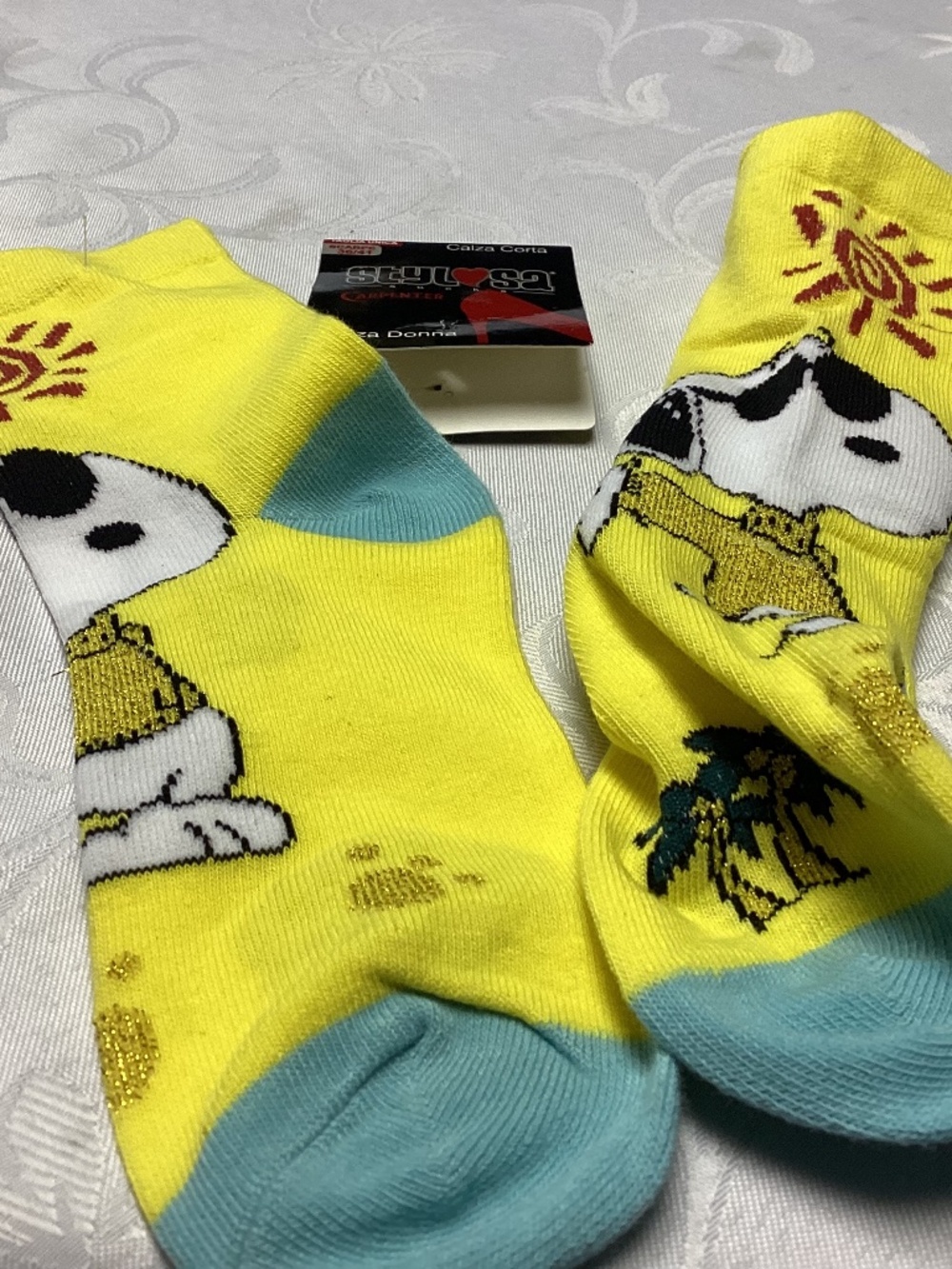 Snoopy GIRLS SOCKS. , lots of glitter really really cute. 5 inches with stretch.
